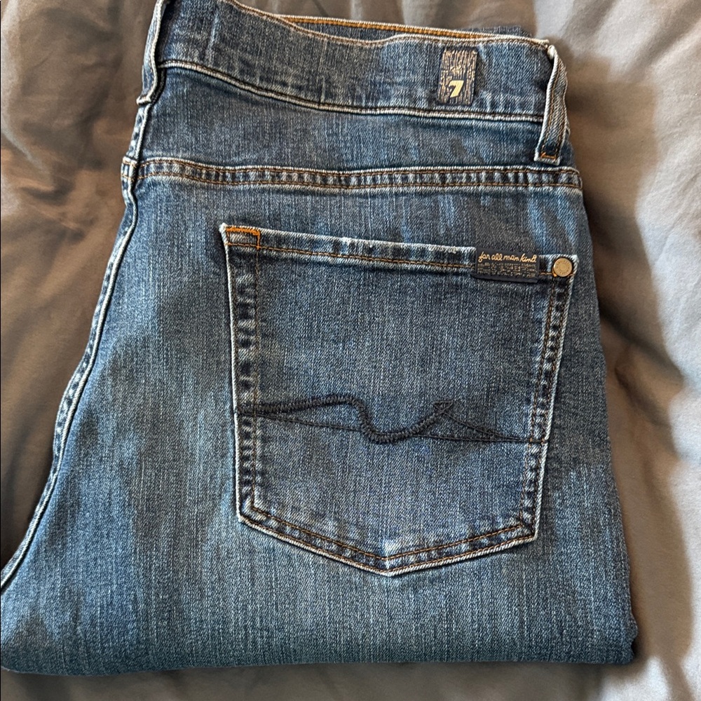 7 For All Mankind Medium Blue Denim Jeans airweft with Back Pocket Stitch